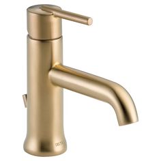 a gold faucet on a white background