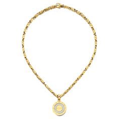 Bvlgari "Zodiac" pendant gold necklace, made in Italy Circular-shaped medallion pendant with all twelve zodiac symbols, featuring one round brilliant-cut diamond on the left side; marked Bvlgari, 585, Made in Italy, Italian assay marks Size: pendant width 0.88 inch, length 0.88 inch; chain length 17 inches Total weight: 39.1 grams Zodiac Pendant Necklace, Zodiac Pendant, Zodiac Symbols, Modern Necklaces, Pendant Gold, Gold Pendant Necklace, Round Brilliant Cut Diamond, Monster High, Made In