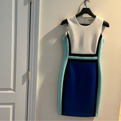 Calvin Klein Women's Colorblock Sheath Dress Beautiful Blue, Black, Aqua And White Colors Size 8 - Fits Beautifully!! Elegant Fitted Color Block Mini Dress, Elegant Color Block Mini Dress, Blue Color Block Dress For Work, Fitted Blue Color Block Dress, White Colors, Calvin Klein Woman, Size 8 Dress, Dress Beautiful, Beautiful Blue