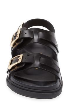 Double buckles punctuate the straps of this contoured sandal crafted from soft leather with a shock-absorbing footbed. Cushioned footbed with arch support Leather upper and lining/synthetic sole Made in Germany Leather Sandals With Rectangular Buckle, Black Double Strap Footbed Sandals With Tang Buckle, Leather Footbed Sandals With Rectangular Buckle, Black Leather Footbed Sandals With Tang Buckle, Black Leather Sport Sandals With Buckle Closure, Black Sandals With Rectangular Buckle Closure, Leather Double Strap Footbed Sandals With Heel Loop, Leather Open Toe Sandals With Brass Buckle, Adjustable Black Sandals With Buckle