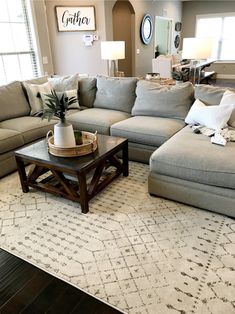 a living room filled with lots of furniture