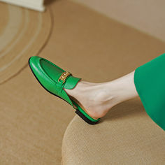 Handmade from premium leather. these loafer mules are really comfortable and breathable. Boasting chain decoration. these green mules help you show an easy chic look. Upper: Genuine Leather Lining: Genuine Leather Outsole: TPR Toe: Round Toe Closure: Slip on Color: White. Royal Blue. White is_handmade: Yes Elegant Green Slip-on Mules, Chic Green Mules For Formal Occasions, Green Slip-on Mules, Chic Green Slip-on Mules, Green Slip-on Loafers For Office, Green Slip-on Loafers For Spring, Spring Green Slip-on Loafers, Chic Green Mules With Flat Heel, Chic Green Leather Mules