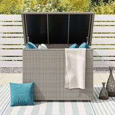 Protect your outdoor cushions from the elements and add some extra seating with this cushion storage box. With weather-resistant resin wicker and waterproof lining, this storage bench ensures your cushions stay dry and free from sun damage. Octans 46.4-in x 28.7-in Gray Outdoor Storage Shed | SL2C00097 Small Outdoor Storage, Outdoor Storage Shed, Cushion Storage, Patio Storage, Deck Box, Outdoor Storage Sheds, Cover Style, Pool Toys, Fire Table