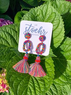 "Great summer earrings! Lightweight style & colorful design liven up any occasion 💕🔥 Measures 3.5\" long - - - - - Thank you for your interest in LMStoehr Designs! Be sure to follow us online for discounts, giveaways & deals! FACEBOOK.com/LMStoehrDesigns TWITTER.com/LMStoehrDesigns INSTAGRAM.com/LMStoehrDesigns" Multicolor Beaded Tassel Earrings For Beach, Multicolor Tassel Earrings For Beach In Spring, Multicolor Tassel Earrings For Summer Beach, Spring Beach Tassel Drop Earrings, Bohemian Multicolor Tassel Earrings For Beach, Multicolor Tassel Earrings For Summer Festival, Fun Beaded Dangle Earrings For Beach, Summer Orange Tassel Earrings Gift, Multicolor Beaded Earrings For Summer Vacation