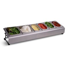 a stainless steel food warmer with four compartments filled with different types of vegetables and sauces