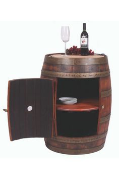 a wooden barrel with a wine glass on top