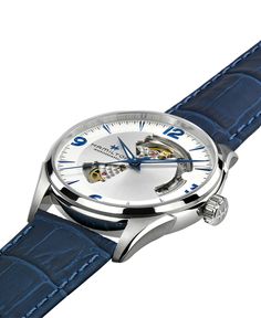 Hamilton's Jazzmaster watch balances tradition with ingenuity. Swiss-made with automatic movement. Style #H32705651 Timeless Blue Watch With Skeleton Dial, Timeless Blue Skeleton Dial Watch, Elegant Blue Watch With Skeleton Dial, Elegant Blue Skeleton Dial Watch, Blue Automatic Watches For Formal Occasions, Formal Blue Automatic Watches, Classic Blue Watch Bands For Formal Occasions, Blue Timeless Watch With Skeleton Dial, Blue Business Watch With Leather Strap