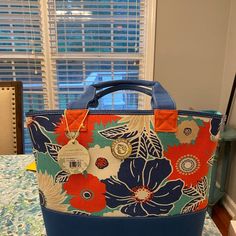 Blue, Red, White, And Turquoise Floral Print Tote Bag From Spartina 449. Bag Is Too Little. Never Carried. Still Has Tags. Would Make A Great Beach Bag Or Purse. Bag Stand Up On Its Own And Straps Are Long Enough To Carry On Shoulder. Great Bag Just Needed It To Be Bigger For My Needs. Blue Bucket Bag For Spring, Spring Large Capacity Blue Shoulder Bag, Blue Tote Shoulder Bag For Spring, Blue Travel Bags For Spring, Blue Shoulder Bag With Zipper For Summer, Trendy Blue Floral Print Bags, Chic Blue Floral Print Bag, Spring Vacation Blue Bag, Spring Vacation Blue Bags