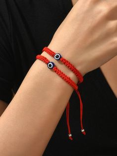 Handmade Red Evil Eye Bracelet, Casual Evil Eye Bracelets, Trendy Red Resizable Jewelry, Casual Red Resizable Friendship Bracelets, Casual Red Friendship Jewelry, Red Braided Bracelet With Round Beads, Red Resizable Braided Beaded Bracelet, Red Braided Bracelets With Resizable Round Beads, Red Braided Bracelet With Resizable Round Beads