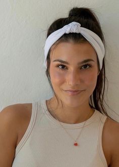 "Instantly elevate any hairstyle with this ultra stretchy, super soft top knot headband.  Product Details Super stretchy, lightweight, luxuriously soft fabric. Wear the knot at the back and transform this top knot into a non-slip, athletic headband. 5\" wide, scrunchable to desired width.  Washer and dryer safe. Do not bleach or iron. Stylist tip: you can tighten or loosen the knot to adjust the size of the headband, so it always fits just how you want it to. One size fits most adults." Headband White, Top Knot Headband, Athletic Headbands, Workout Headband, Top Knot Headbands, White Headband, Stretchy Tops, Turban Headbands, Running Tops