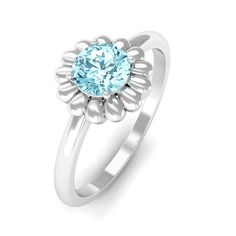 Product Details Blossom in elegance with this Solitaire Aquamarine Floral Ring. A delicate design that captures the essence of natures beauty and exudes a radiant charm. Product Information SKU SHP-RINGS082223753 Weight 2.30 gm (Approximate) AQUAMARINE INFORMATION No.of Stones 1 Pieces Total Weight 0.45 Carat (Approximate) Dimension(approx) Round-5X5 mm-1 Pcs Color Blue Cut Brilliant Shape Round Setting Type Prong-Setting Quality Grade AAA View More Product Parent Collection Handle aquamarine-rings Elegant Flower Shaped Birthstone Ring With Gemstone, Elegant White Gold Flower Ring With Birthstone, White Gold Flower Ring With Birthstone, Elegant Flower Shaped Birthstone Rings, Elegant Flower-shaped Birthstone Rings, Elegant Flower Shape Birthstone Rings, Floral Ring, Delicate Design, Aquamarine Rings