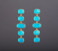 This pair of five-tier genuine turquoise earrings would be nice reward for yourself or a great gift for your mother or best friend.Each one has five turquoise stones set in gold plated bezels and connected in tandem.1. Stones : turquoise (reconstituted stabilized) 2. Stone shape and size:middle stone: about 16 x 10 mmother stone about  :  12 x 10 mm,3. earring total length ~ 64 mm4. bezel material: 24k gold vermail5. earring post: 24k gold vermail6. if sending as a gift, a personalized note card Turquoise Stone Jewelry, Earring Frame, String Earrings, Earring Long, Turquoise Earring, Engraved Locket, Natural Turquoise Stone, Turquoise Earrings Dangle, Earring Ideas