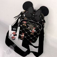 Condition: Brand New With Original Tags. Description: This Gorgeous Little Crossbody By Disney Features The Iconic Minnie Mouse And A Bow-Centric Graphic Design That Is Clearly Meant To Evoke Luxury Designers Such As Gucci Or Louis Vuitton. Stylish And Adorable, Great For Walking Around The Park, It’s Large Enough To Hold All Your Daily Essentials, But Not To Weigh You Down Or Get In The Way Of Rides! Features: Authentic Licensed Disney Limited Edition Double Compartment-Style (Main, Front) Zip Disney Style Black School Bags, Crossbody Shoulder Bag For Disney Trips, Trendy Minnie Mouse Bags For Daily Use, Casual Minnie Mouse Bag For Everyday Use, Disney Black School Bags, Minnie Mouse Bags For Disney Trips, Black Mickey Mouse Bag For Disney Fan Events, Black Minnie Mouse Bag For Disney Trips, Black Minnie Mouse Bag For Everyday Use