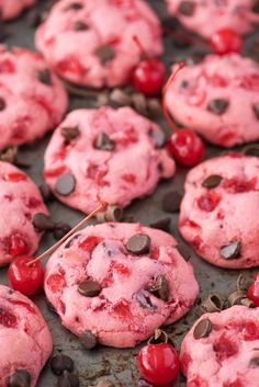 cherry chocolate chip cookies on a baking sheet