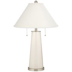 a table lamp with a white shade on it