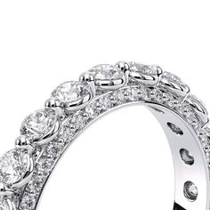 a white gold ring with diamonds on it