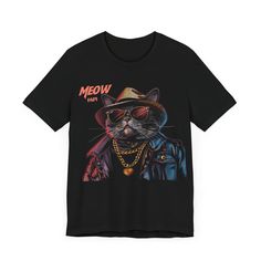 Step up your game with the "Swag Cat Tee - 'Meow Papi' Edition," the ultimate t-shirt for feline fans who appreciate a blend of humor and style. This shirt features a slick cat decked out in the coolest fashion: a fedora, shades, and a gold chain—pure meow magnificence. It's not just a t-shirt; it's a statement that says you're bold, confident, and ready to take on the world with the same charisma as 'Meow Papi' himself. Whether you're lounging or out on the prowl, make a statement that's imposs Black Gamer Top With Screen Print, Black Novelty T-shirt For Fan Merchandise, Novelty Black T-shirt With Screen Print, Novelty Screen Print T-shirt For Streetwear, Novelty Streetwear T-shirt With Screen Print, Black Novelty T-shirt With Screen Print, Black Screen Print Novelty T-shirt, Graphic Tee With Cat Print For Streetwear, Novelty Screen Print Streetwear T-shirt