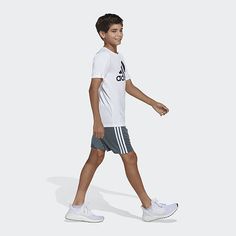 He'll stay dry and comfortable no matter what the day brings in this boys' AEROREADY t-shirt. An adidas Badge of Sport on the chest gives it a sporty look. One universal fact about kids: They are always growing and changing and their bodies are, too. That's why we now offer kids' extended sizing for our most popular apparel. Because kids deserve great-fitting, functional gear they can feel confident wearing. For years, our industry has used phrases like "plus size" and "husky size" to label some kids' changing bodies. Our extended sizing isn't about labeling, it's about updating our size range to make it easier for children (and their parents) to find that just-right size.Closure Type: Pullover HeadFit: Loose FitNeckline: Crew NeckSleeve Length: Short SleeveFiber Content: 100% PolyesterFab Adidas Casual Activewear For Outdoor Activities, Casual Adidas Activewear For Outdoor Activities, Casual Adidas T-shirt For Gym, Adidas Gym T-shirt With Short Sleeves, Sporty White T-shirt For Outdoor Activities, Universal Facts, White Husky, Adidas Shorts, Sporty Look