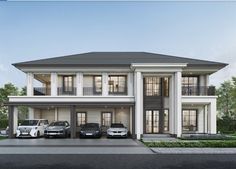 two cars are parked in front of a three - story house with balconies