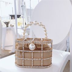 Item Type: Clutch Gender: Women Material: Polyester, Metal, Plastic Size: 19 x 9 x 13 cm / 7.48 x 3.54 x 5.12 inch Style: Vintage Package Includes: 1 x Pc Pearl Decorations, Diamond Decorations, Summer Handbags, Crystal Clutch, Clutches For Women, Party Purse, Velvet Interiors, Luxury Diamonds, Evening Handbag