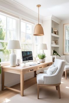 a home office with a desk, chair and computer