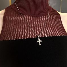 This vintage mini cross necklace adds a touch of timeless elegance to any outfit. Crafted with intricate detail, it exudes sophistication and sophistication. This necklace is a must-have for those seeking a touch of luxury in their accessories. Elevate your style with this exclusive piece. Features: -Brand: WIC -Style: Original design -Material: Silver+ruby -Color: Silver Pink -Size: 5.6MM -Weight: About 4G - Whether to wear a pendant: Yes Elegant Pendant Cross Necklace With Clavicle Chain, Elegant Cross Pendant Necklace With Clavicle Chain, Elegant Necklace With Clavicle Chain And Cross Pendant, Classic Cross Clavicle Chain Necklace, Elegant Crucifix Cross Necklace, Elegant Silver Cross Necklace, Elegant Sterling Silver Cross Necklace, Elegant Silver Crucifix Necklace, Elegant Sterling Silver Crucifix Necklace