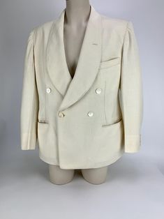 Rare... 1930's-40's Double Breasted Linen Jacket by PALM BEACH for Maurice L. Rothschild.. in a natural creamy white linen. The double breasted jacket is a larger size, which is unusual to find.. This jacket has a wide shawl collar with natural mother of pearl buttons, a ventless back, one breast pocket and 2 low welt pockets. There is one interior breast pocket as well. This is a fine quality medium weight natural Palm Beach linen cloth. The labels read: Tailored by Goodall    PALM BEACH  reg. u.s. pat.off. From the Genuine Cloth for: Maurice L. Rothschild The fabric is authentic PALM BEACH Cloth, beautiful quality weave. This suit is washable, with instructions like all Palm Beach Suits from the same period. This suit is in EXCELLENT VINTAGE CONDITION.. with only very minor light smudge White Vintage Formal Outerwear, White Vintage Outerwear For Formal Occasions, Vintage White Formal Outerwear, White Vintage Formal Blazer, Vintage White Formal Blazer, Vintage Spring Sport Coat With Welt Pockets, Vintage Fitted Sport Coat, Vintage Beige Formal Blazer, Vintage Beige Blazer For Formal Occasions