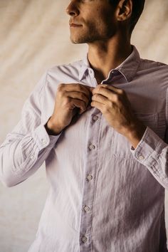 We’ve taken your everyday office friendly work shirt up a notch or five. This ultra soft shirt is made from a double gauze 100% organic cotton giving it a nice natural soft texture. Reinforced with thick durable buttons - trust us, you won’t be losing any of these, It’s the perfect length leaving you the option to tuck in or not. From your weekend getaway to client meetings, the Ripper shirt is a true multi-purpose champ giving you the perfect blend of sophistication and comfort. Business Casual Purple Cotton Shirt, Purple Cotton Business Casual Shirt, Lavender Long Sleeve Shirt For Work, Everyday Lavender Cotton Tops, Purple Cotton Shirt With Pockets, Casual Lavender Cotton Shirt, Purple Shirt With Relaxed Fit And Buttons, Purple Shirt With Buttons And Relaxed Fit, Purple Relaxed Fit Shirt With Buttons