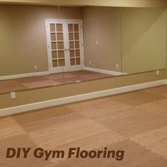 Light brown, hard wood tiles from Greatmats. Perfect for a home gym. Large mirror and studio space. Diy Gym, Exercise Yoga, Gym Flooring, Wall Installation, Kickboxing, Zumba