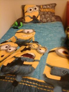 the bed is made up to look like minions from the movie despicables