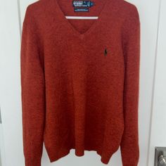 Beautiful Men's Polo Rl Lambswool V-Neck Sweater New Without Tags Sz L 100% Lambswool In An Awesome Rare Marled Burnt Orange Color With A Dark Green Pony All Measurements Are Approximate And Taken Across In Inches Length: 26 Top Of Shoulder To Hem Chest: 22.75 Across Underarms Questions? Please Message Me From A Clean, Smoke Free Home Casual Wool V-neck Top, Wool V-neck Polo Sweater For Fall, Orange V-neck Sweater For Fall, Classic Orange Top For Fall, Classic Orange Tops For Fall, Casual Wool Polo Sweater With V-neck, Casual Wool V-neck Polo Sweater, Burnt Orange Long Sleeve Winter Sweater, Polo Ralph Lauren Sweater