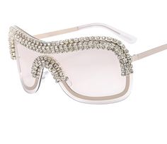 The "Hollywood" sunglasses are the perfect finishing touch to any outfit. offering a rare blend of high-street fashion and casual chic you won't find anywhere else. Featuring modern full-frame construction. gradient design and stylish rhinestone accented frames. We know that you'll love the way you look and feel in this exclusive piece. Turn heads. This is not sold in stores. and there is very limited quantity. Designed for style and comfort Meticulous craftsmanship Non-polarized Lens material: PC Frame material: Metal alloy Trendy Crystal Sunglasses With Rhinestones, Trendy Rhinestone Crystal Sunglasses, Trendy Evening Shield Sunglasses With Uv Protection, Silver Sunglasses For Summer Evenings, Glamorous Silver Sunglasses With Tinted Lenses, Elegant Shield Sunglasses For Spring, Glamorous Silver Tinted Sunglasses, Trendy Evening Shield Sunglasses With Mirrored Lenses, Trendy Evening Shield Sunglasses For Summer