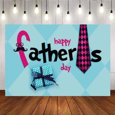 a happy father's day banner with presents and a tie on the floor in front of it