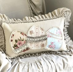 a decorative pillow on top of a chair