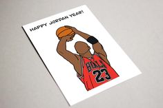 a card with an image of a basketball player and the words happy japan year on it