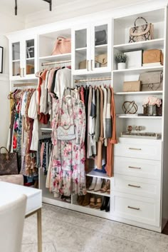 an organized closet with clothes and handbags