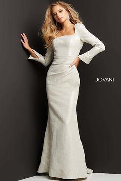 Jovani 06996 - Reverse sweetheart neckline with long sleeves, ruching, and a metallic material/ pattern. Mother Of The Bride Gowns, Jovani Dress, Long Sleeve Evening Gowns, Mother Of The Bride Gown, Mermaid Evening Gown, Long Sleeve Dress Formal, Jovani Dresses, Unique Prom Dresses, Long Sleeve Gown