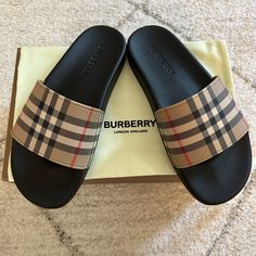 New Women’s Burberry Slides. Euro 40 / Us 9-9.5 Reasonable Offers Are Accepted Popular Shoes 2024, Glitter Jordans, Burberry Slippers, Burberry Slides, Burberry Sandals, Cheer Season, Pretty Sneakers, Designer Slides, Pretty Shoes Sneakers