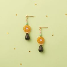 Black Teadrops beaded Dangle Earrings, with a Stainless steel earring with a 18k gold plated post to ensuring your comfort and safety.  They were designed with natural carefully selected Czech glass beads, and some hand painted touchs creating a bright and unique combination. Your Earrings will be made to order, so please note it could take one or two days to ship. The earrings will came nice packaged in a delicate cardboard, a soft Velvet Bag and a small Box, to protect them during the shipment. CARE INSTRUCTIONS Polish off your jewelry using a soft polishing cloth. This will help maintain its shine. Safe in the water but avoid contact with perfumes, detergents, and other skincare products. Avoid exercising in your jewelry or going into chlorinated pools. Sun Celestial, Celestial Earrings, Earrings Beaded, Drop Dangle Earrings, Beaded Dangle Earrings, Velvet Bag, Etsy Earrings Dangle, Stainless Steel Earrings, How To Make Earrings