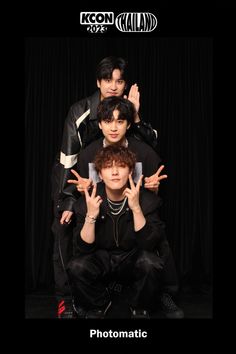 three young men posing for a photo in front of a black background with the words kpop