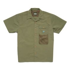 A layerable tech shirt with ample stash pockets for foraging Utility Tops With Side Pockets For Outdoor, Outdoor Cotton Top With Multiple Pockets, Cotton Outdoor Top With Multiple Pockets, Utility Tops With Pockets For Outdoor, Utility Style Tops With Pockets For Outdoor, Utility Style Short Sleeve Tops With Cargo Pockets, Utility Tops With Cargo Pockets And Short Sleeves, Khaki Camp Shirt With Relaxed Fit And Pockets, Relaxed Fit Khaki Camp Shirt With Pockets