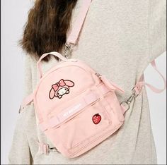 Melo and Kuro Mini Backpack This adorable Melo and Kuro Mini Backpack is perfect for carrying your essentials in style. With its compact size and charming design, it's both functional and cute. Stay organized and on trend with this must-have accessory. Sanrio Fashion, My Melody, Stay Organized, Mini Backpack, Staying Organized, Latest Trends, Backpacks, Fashion Tips, Design