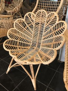 wicker chairs and tables are lined up on the floor