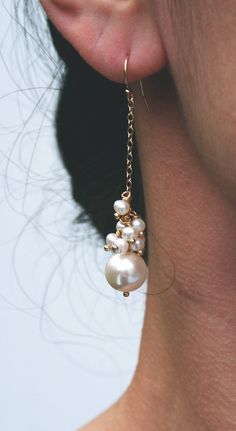 You need a pair of earrings that are beautiful, without detracting from your stunning gown. Yes, these are those earrings. Super feminine earrings of freshwater pearls and a single large freshwater pearl. These earrings would be perfect for holiday occasions or a wedding. + Large Freshwater Pearl. Freshwater Pearls. 14K Gold Fill Chain & Ear Wire. + Earrings measure 2.25 inches (6.35 cm) in length. (If you need shorter, leave a message in the notes box upon checkout). + Earrings are ready to Pearl Drop Earrings Bridal, Jewellery Shops, Feminine Earrings, Pearl Earrings Wedding, Bridal Earrings Pearl, Earrings Pearl, Pearl Earrings Dangle, Antique Earrings, Jewelry Wedding