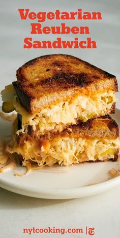 a grilled cheese sandwich on a white plate with the words vegetarian reuben sandwich over it