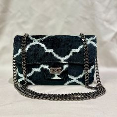 Mila∞Miro by Emelie · Divine coco bag in handwoven Uzbek ikat · Made of 100% silk velvet fabric · Black chain and inner pocket with zipper · Carried as crossbody, shoulder and top-handle bag · Size ±: W22 x H15 x D6 cm (9 x 6 x 2.5 inch) · Free shipping! Kindly note: - These bags are made-to-order. Position of pattern can differ from product pictures displayed. Colors in reality may also differ a bit depending on angle, light, and the screen of your device. - Ikat is an exquisite fabric, every p Luxury Woven Clutch Shoulder Bag, Luxury Woven Bags As Fashion Accessory, Uzbek Ikat, Silk Velvet Fabric, Fabric Black, Black Chain, Product Pictures, Silk Velvet, Handle Bag