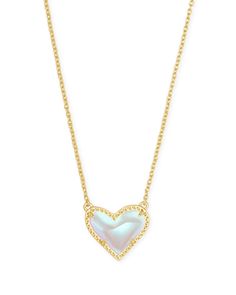 Feminine and classic with an asymmetrical design, the Ari Heart Gold Pendant Necklace in Dichroic Glass is our new obsession. Layer it or let it shine on its own - either way you'll be hearing "Where'd you get that?" every time you wear this pendant necklace out. Heart Pendant Necklace Gold, Short Pendant Necklace, Preppy Jewelry, Rose Gold Quartz, Kendra Scott Necklace, New Obsession, Let It Shine, Gold Heart Necklace, Old Jewelry