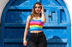 This bright and bold rainbow stripe women's cropped tank top is so very colourful and happy, made with my funky rainbow stripe design which is printed on a smooth stretch fabric. This is the rainbow of all rainbow tops to make a statement, and spread some love and colour. Whether you are going to yoga, a festival, clubbing, the gym, pride, or dancing in your living room, this rainbow vest top is make you smile from withinbecause life is too short to wear boring clothes...right!! This rainbow ves Rainbow Vest, Rainbow Top, Rainbow Jewelry, Boring Clothes, Rainbow Earrings, Cropped Tube Top, Striped Crop Top, Rainbow Stripes, Vest Top