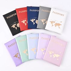 six passport covers in different colors with the world map on one side, and the word passport printed on the other