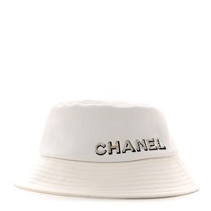 This is an authentic CHANEL Fabric Logo Bucket Hat S in White. The hat is crafted in white fabric with an embellished CHANEL logo. 1401729 Designer White Visor Hat, Luxury Wide Brim Summer Bucket Hat, Luxury Wide Brim Bucket Hat For Summer, Designer White Hat With Curved Brim, Luxury White Visor Hat, Elegant White Bucket Hat, Luxury White Adjustable Hat, Classic White Bucket Hat With Short Brim, Designer White Flat Brim Hat